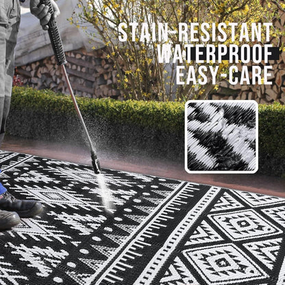 OLANLY Waterproof Outdoor Rug 4x6 ft, Reversible Plastic Straw Patio Camping Rugs, Large Foldable Outdoor Carpet Deck Rugs for Patio, RV, Outside Entry, Backyard, Bench, Picnic, Black & White