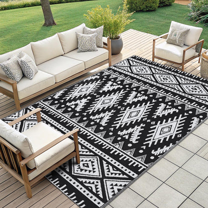 OLANLY Waterproof Outdoor Rug 4x6 ft, Reversible Plastic Straw Patio Camping Rugs, Large Foldable Outdoor Carpet Deck Rugs for Patio, RV, Outside Entry, Backyard, Bench, Picnic, Black & White