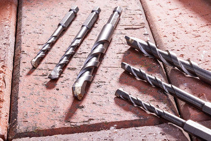 NordWolf 12-Piece Metric Masonry Drill Bit Set with 1/4" Hex Shank, Carbide Tipped for Concrete, Brick, Block & Stone, Sizes 4 to 10mm in Storage Case